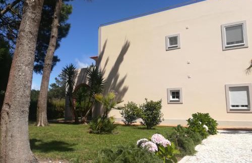 Praia del Rei Apartment | Relax at Praia Del Rey Beach with Three Inviting Pools