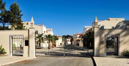 Praia del Rei Apartment | Relax at Praia Del Rey Beach with Three Inviting Pools