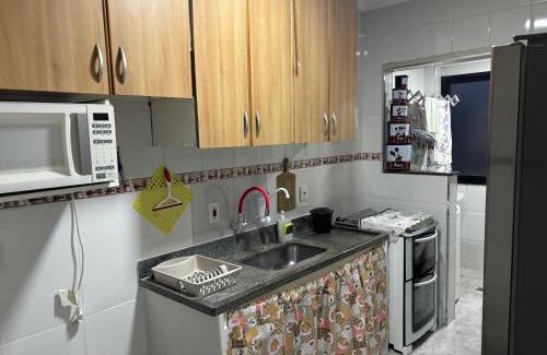 Guilhermina Apartment | Family-Friendly Stay at Praia Grande - Book Your Getaway!