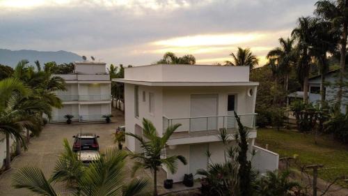 Florianopolis House | Exclusive Beachfront Escape at Praia por do Sol