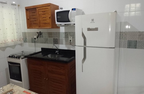 Tabatinga Apartment | Praialar Apt: Pet-Friendly Suite with Full Kitchen, Steps to Beach
