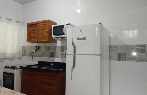 Tabatinga Apartment | Praialar Apt: Pet-Friendly Suite with Full Kitchen, Steps to Beach