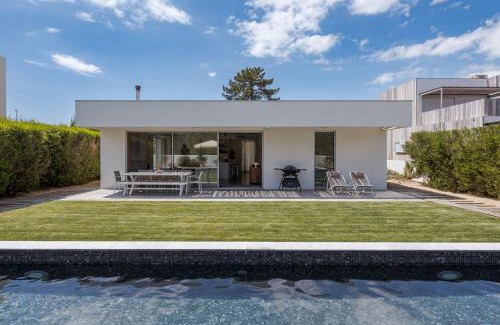 Troia Villa | Tranquil Retreat: Precious House with Oceanfront Pool