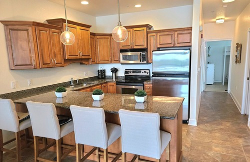 Elkhart Lake Condo | Scenic Patio Overlooking Elkhart Lake - Steps to Dining!