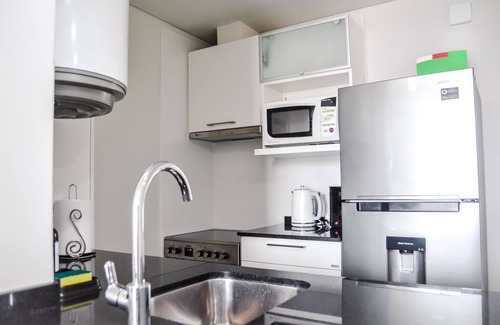 Parana Apartment | Stunning Rooftop Pool with Panoramic Views in Prime Location