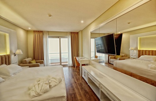 Golem Hotel | Beachfront Paradise: Guest Rated 9.4 with Top Amenities