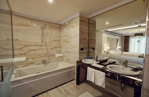 Golem Hotel | Beachfront Paradise: Guest Rated 9.4 with Top Amenities