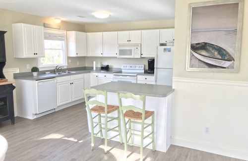 Palisade Acres Cottage | Silver Girl - Elegant 3BR Oasis with Hot Tub by the Beach