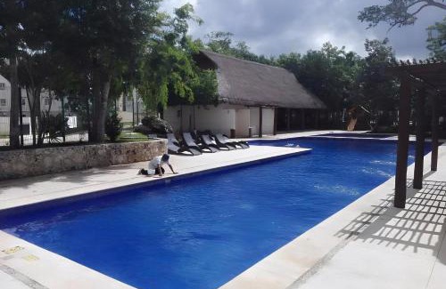 Cancun Apartment | Charming HOEStel Bacaret: Oceanfront Pet-Friendly Retreat