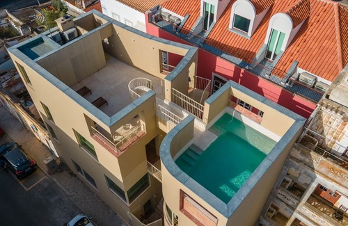 Vila Real Santo Antonio Apartment | Discover Princess Building: Poolside Retreat by LovelyStay