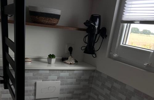 Arbshagen Apartment | Discover Prima Resort Boddenblick: Oceanfront Tiny House Retreat