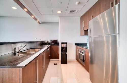 Bur Dubai Apartment | Elegant DIFC Duplex with Iconic Skyline and Pool Access