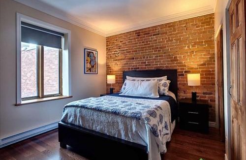 Ville-Marie Apartment | Prime Location Condo with Kitchen, Parking & Gym Access