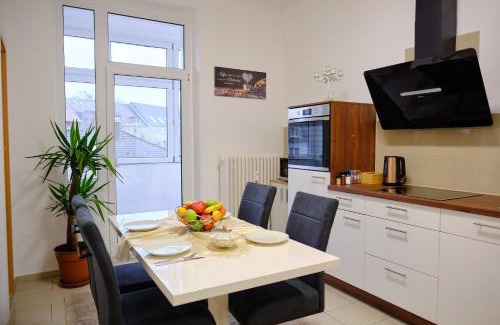Frohnhausen Apartment | PrimeTime Suite for 8 with Kitchen & Free WiFi - Rated 9.5