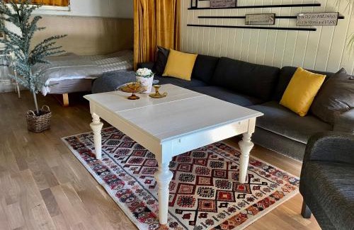 Eidsvoll House | Cozy Basement Room with Ocean View and Shared Amenities