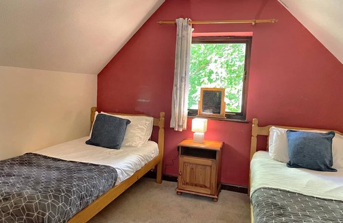 Llanybri House | Inviting Primrose 17 Woodland Lodges with Spa & Hot Tub