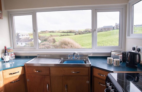 Roch Cottage | Family-Friendly Primrose Cottage with Oceanfront Garden