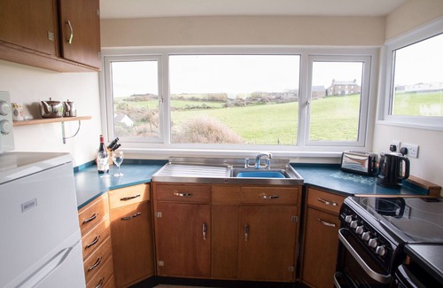 Roch Cottage | Family-Friendly Primrose Cottage with Oceanfront Garden