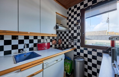 Courseulles-sur-Mer Apartment | Prince Hotel: Steps from the Beach with Ocean Views
