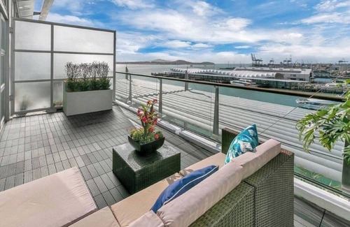 Auckland Central Business District Apartment | Discover Princess Wharf: Balcony Retreat with Great Amenities