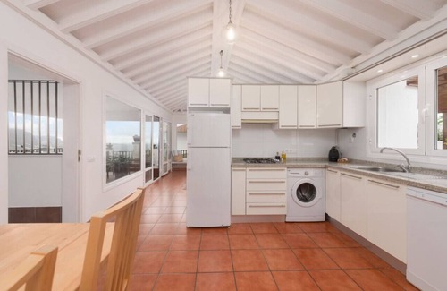 La Mancha Apartment | Exclusive Poolside Retreat with Garden & Ocean Views