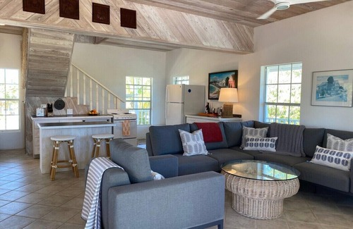 North Palmetto Point Cottage | Explore a Private Beachfront Oasis on Pink Sand Shores