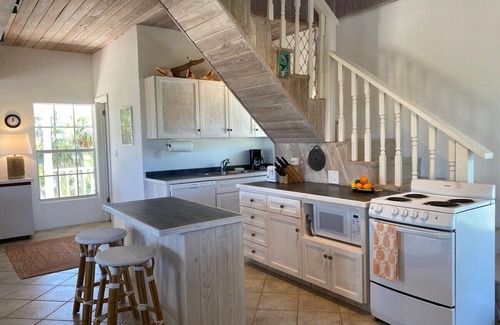 North Palmetto Point Cottage | Explore a Private Beachfront Oasis on Pink Sand Shores