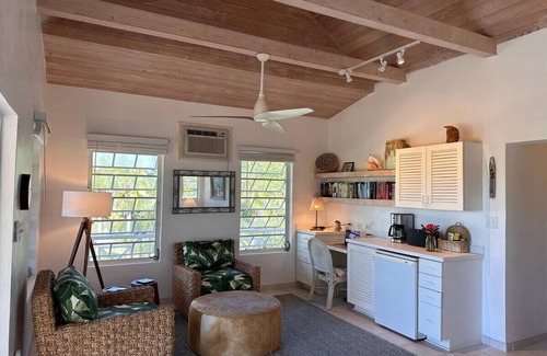 North Palmetto Point Cottage | Explore a Private Beachfront Oasis on Pink Sand Shores