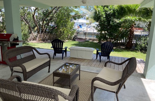 Pirates Cove House | Pet-Friendly Canal Front Home with Pool & Breakfast