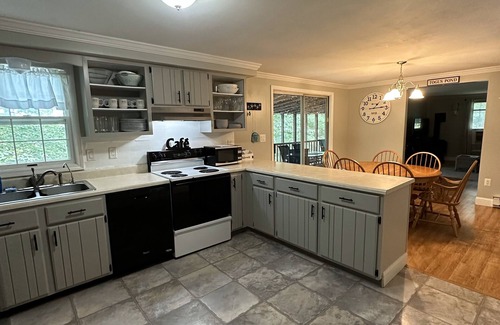 Augusta House | Tranquil Waterfront Retreat with Pool & Lake View Awaits