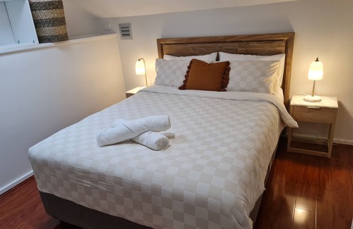 Guildford House | Inviting Two-Storey Guest House Steps from Shops & Transport