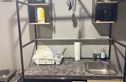 Brandon Condo | Private Basement Suite in Brandon – Kitchenette, Dining & Comfort