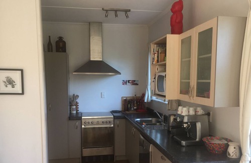 Nelson House | Cozy Central City Sanctuary with Family-Friendly Amenities