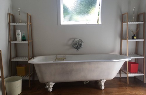 Nelson House | Cozy Central City Sanctuary with Family-Friendly Amenities