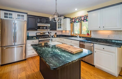 East Haven  Rutland County House | Pet-Friendly Chalet with Hot Tub & Custom WFH Space