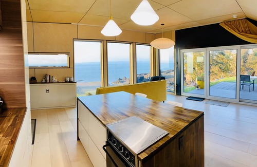 Kings County House | Romantic Coastal Waterfall Retreat with Spa and Ocean Views