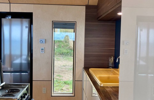 Kings County House | Romantic Coastal Waterfall Retreat with Spa and Ocean Views