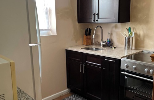 Uniondale House | Inviting First Floor Apartment with Private Entrance & Transit Access