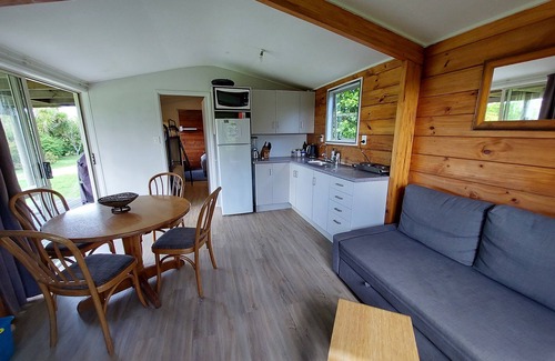 Tapora House | Coastal Waterfront Retreat with Ocean Views and Pet Friendly