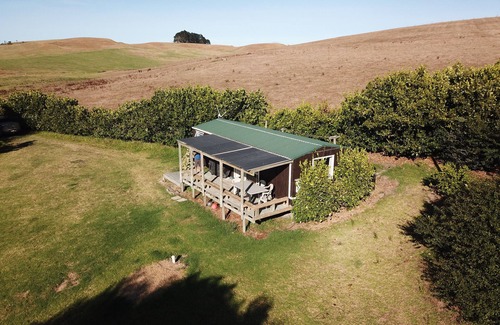 Tapora House | Coastal Waterfront Retreat with Ocean Views and Pet Friendly