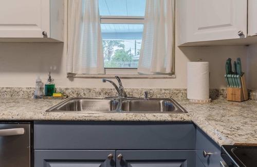 Walsingham House | Relax by the Private Heated Pool Near Indian Rocks Beach