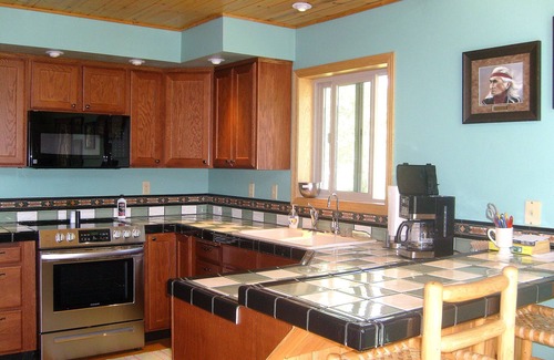 Bedford House | Serene Retreat: Creekside Home with Family-Friendly Amenities