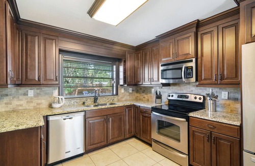 Greater Northdale House | Inviting Private Home with Pool & Game Room Retreat