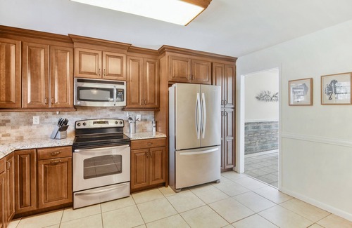 Greater Northdale House | Inviting Private Home with Pool & Game Room Retreat