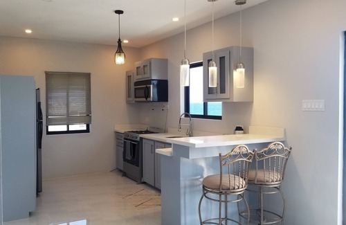 Runaway Bay House | Oceanfront Private House with Pool and Perfect Rating