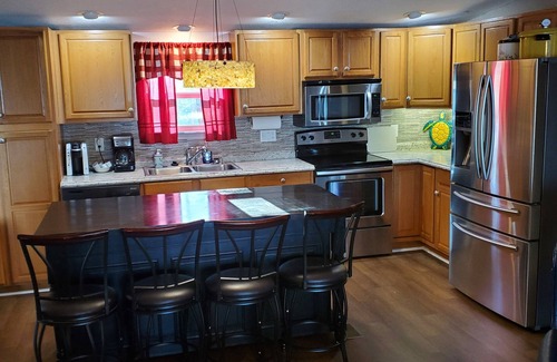 Morris House | Lakefront Retreat: Pet-Friendly Home with Scenic Views