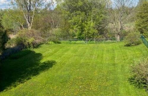 Cobourg Apartment | Eco-Friendly Lakeside Loft with Patio and Family Comfort
