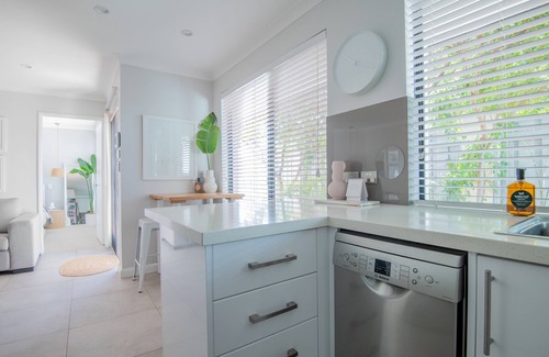Mindarie House | Tranquil Mindarie Retreat: Garden Views & Marina Walks
