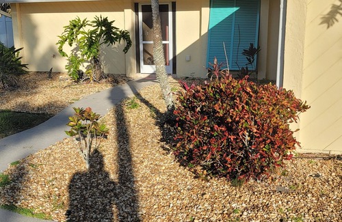Iona House | Serene Retreat: Private Oasis with Pool & Spa Amenities