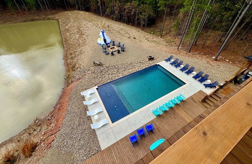 Pickens Cabin | PRIVATE POND! Private heated pool! 6 king suites & bunk room.Sleeps 30.Brand New